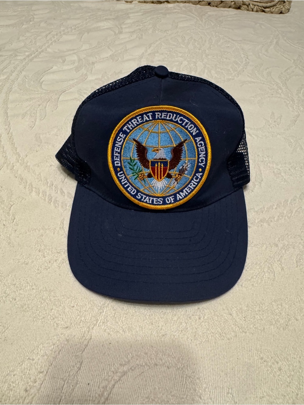 Mesh Trucker Cap with Red and Blue Logo